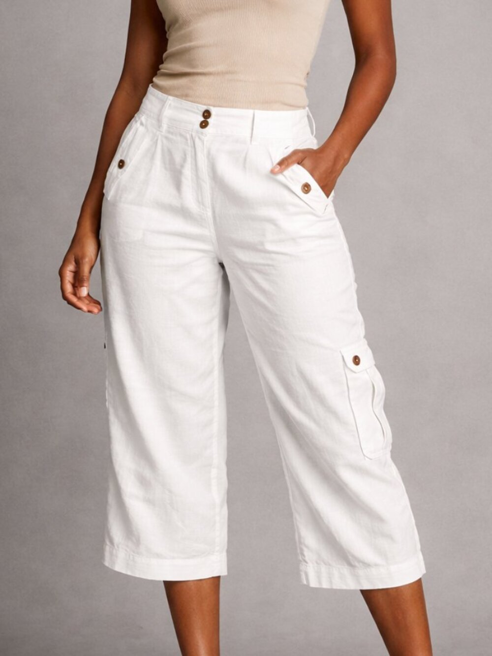 Size 6 - white linen capri pants, pockets, distressed buttons. Summer pants